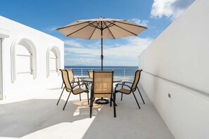 Outdoor dining - Cozy 1-bedroom condo in delightful Cupecoy with Sea View (Lowlands)