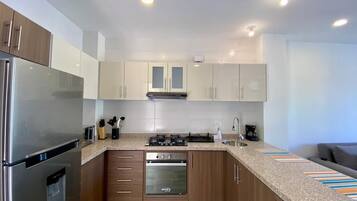 Apartamento, balcón, vistas a la ciudad | Cocina privada