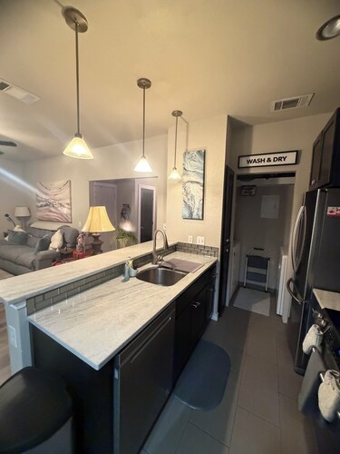 Stylish 1/1 Condo/Modern Comfort/Prime Location in a corner lot, first floor.
