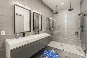 Shower, towels, soap, toilet paper