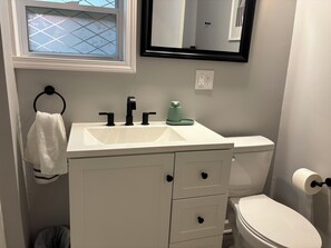 Hair dryer, towels, soap, shampoo