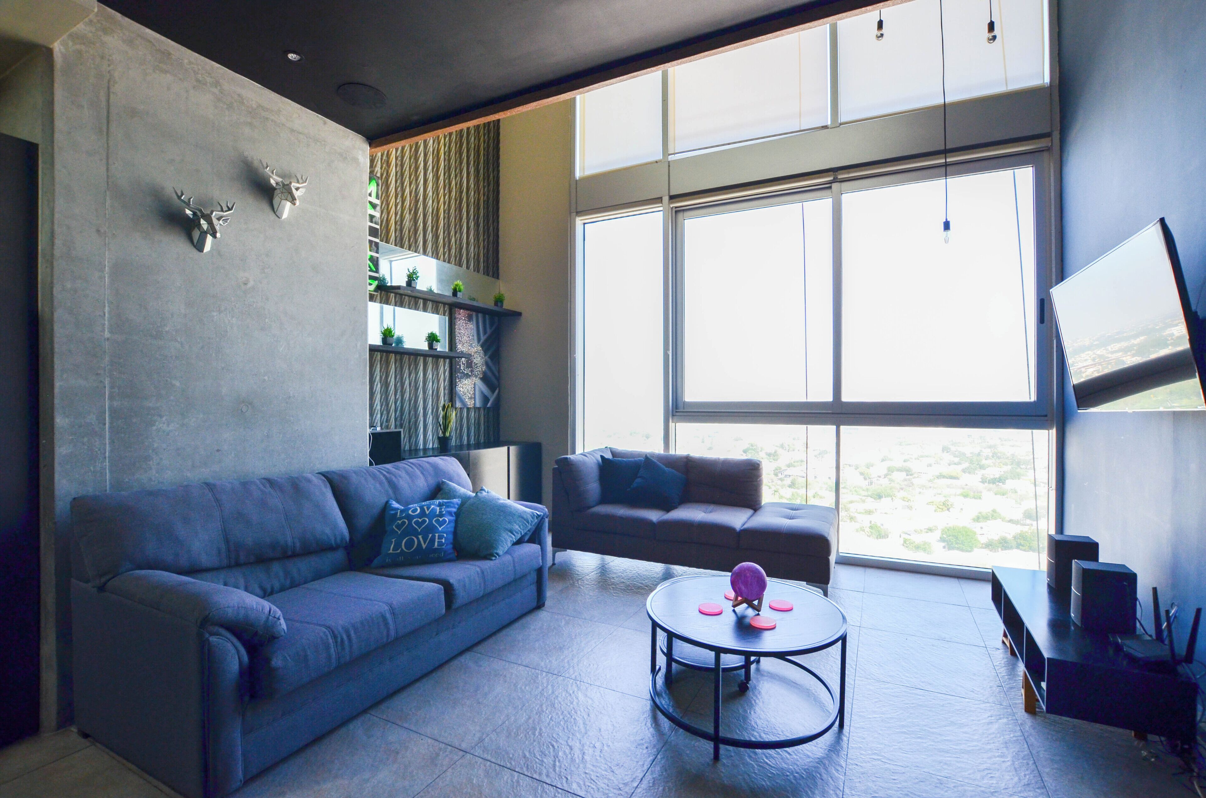 Business Suite | Living area | 60-inch Smart TV with digital channels, streaming services