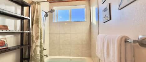 Shower, eco-friendly toiletries, hair dryer, towels