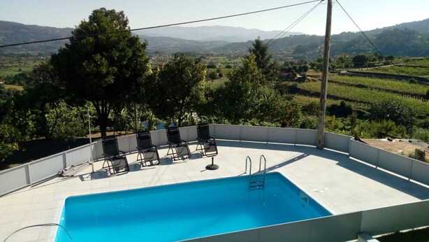 A rooftop pool with a clear view of the surrounding landscape. - Walnut House with Private Pool (Gondufe)