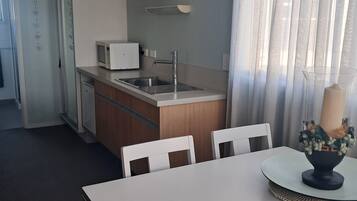 Comfort Studio | Laptop workspace, blackout drapes, iron/ironing board, free WiFi