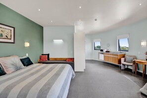 Deluxe Suite, Mountain View | Laptop workspace, blackout drapes, iron/ironing board, free WiFi