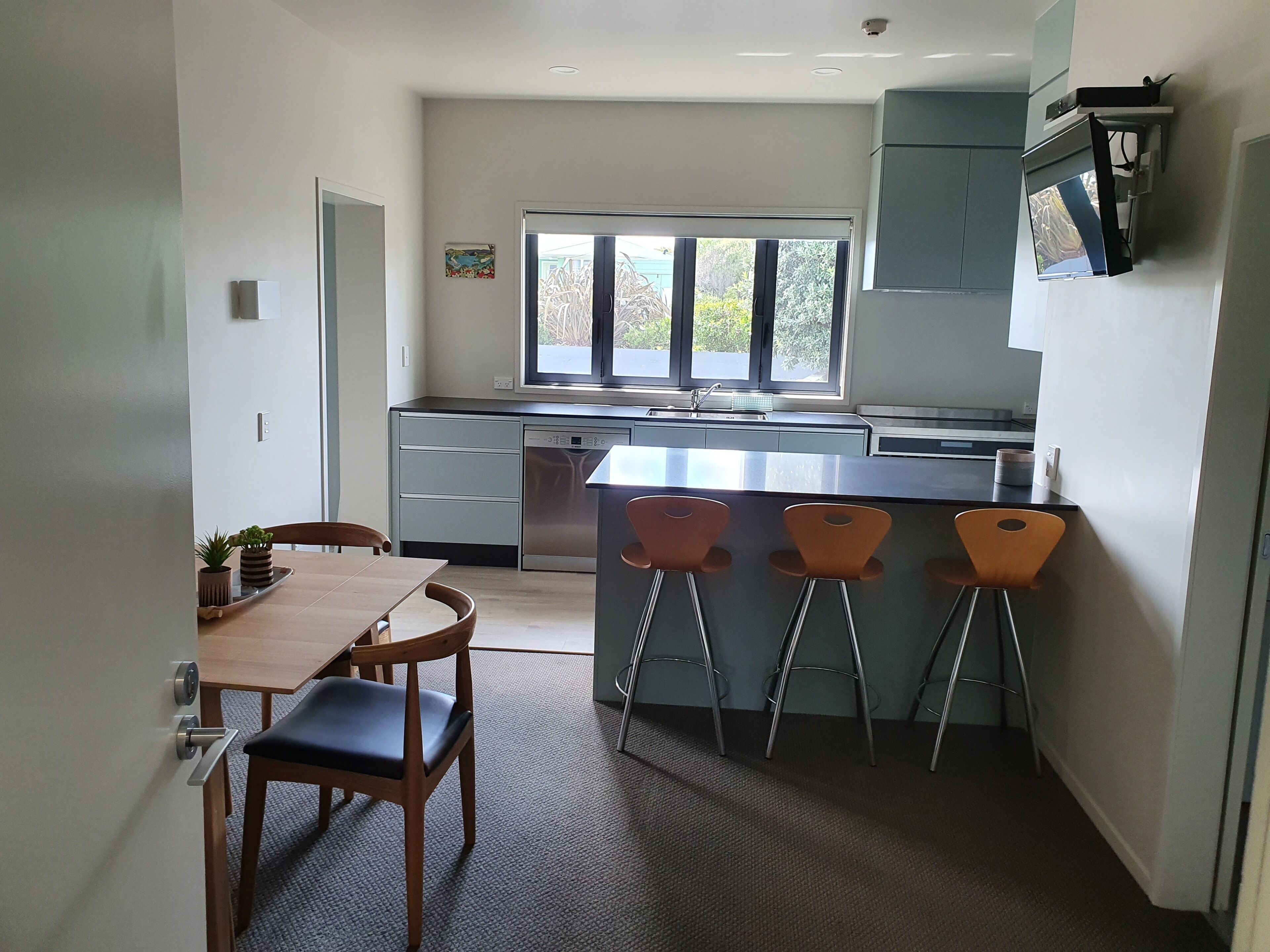 Comfort Apartment | Private kitchen | Microwave, coffee/tea maker, electric kettle, cookware/dishes/utensils