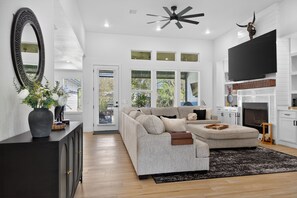 TV, fireplace, books, stereo - Luxe Retreat w/Hot Tub, Patio, Fenced Yard! (Lago Vista)