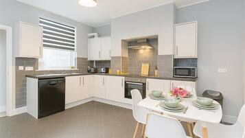 Fridge, microwave, oven, cookware/dishes/utensils