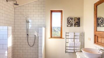 Shower, hair dryer, towels, shampoo