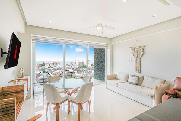 Panoramic Apartment | Living area | 50-inch Smart TV with digital channels