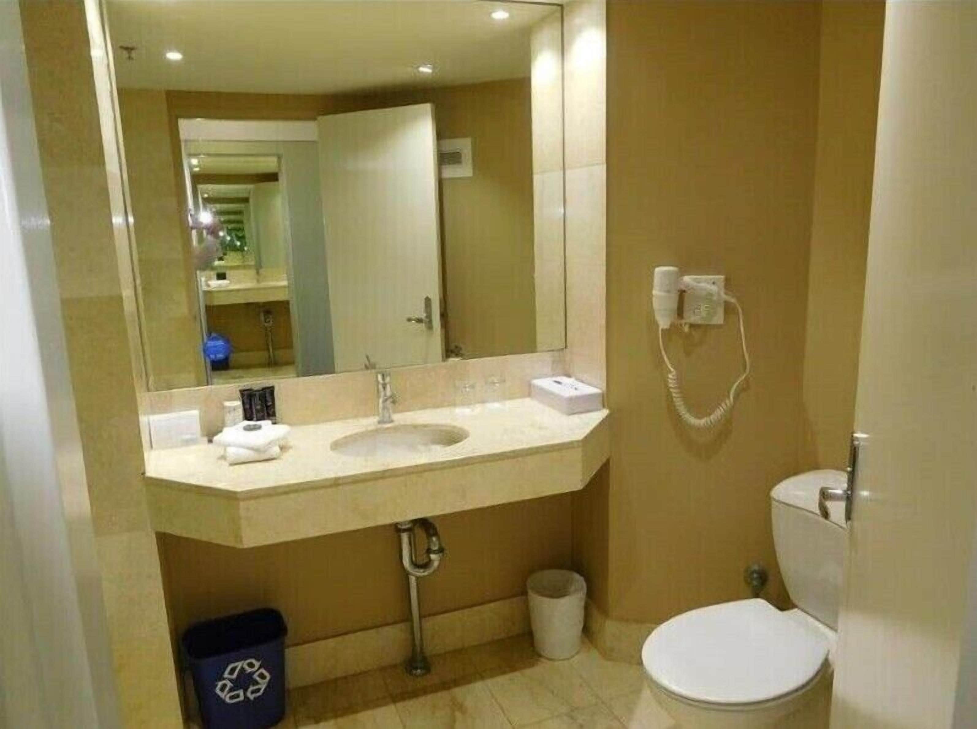 Hair dryer, towels, soap, shampoo
