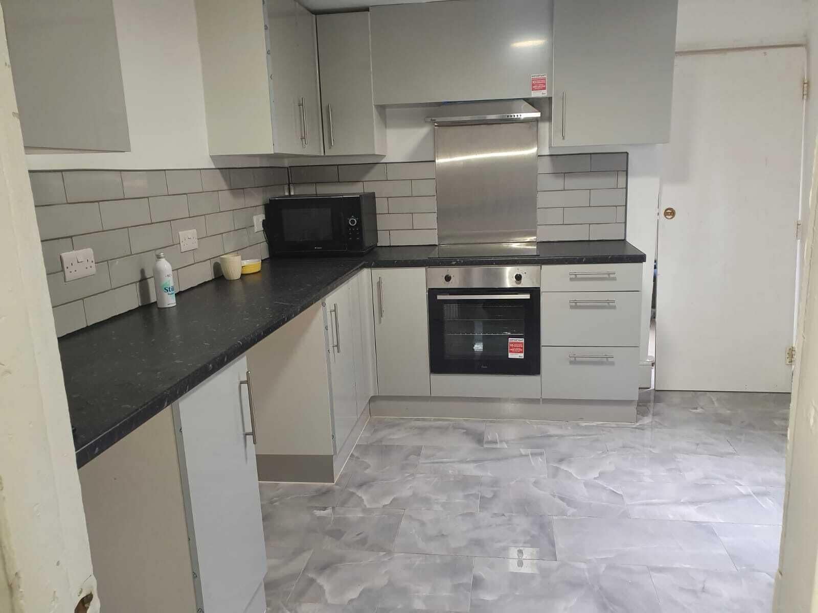 Microwave, oven, electric kettle, paper towels