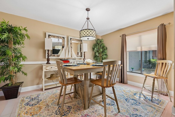This inviting coastal retreat blends comfort, convenience, and classic Lowcountry charm