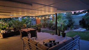 Outdoor dining - Life's good in Parkside - Relaxing 3BR Retreat w Pool & Patio (Parkside)