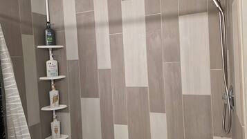 Hair dryer, towels, soap, shampoo
