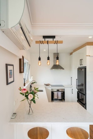 Fridge, microwave, oven, stovetop - Fantastic Family Home | by Furnished Rentals (Auckland)