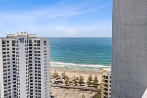 A high-rise building with a view of the ocean and beach. - Legends - 2101 (1BR/1BA) (Gold Coast)