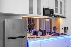 Apartemen Deluks, beberapa kamar, kolam renang pribadi | Dapur pribadi