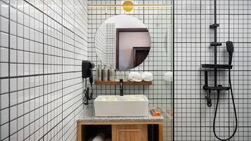 Family Room, Balcony, Pool View | Bathroom | Free toiletries, hair dryer, bathrobes, slippers