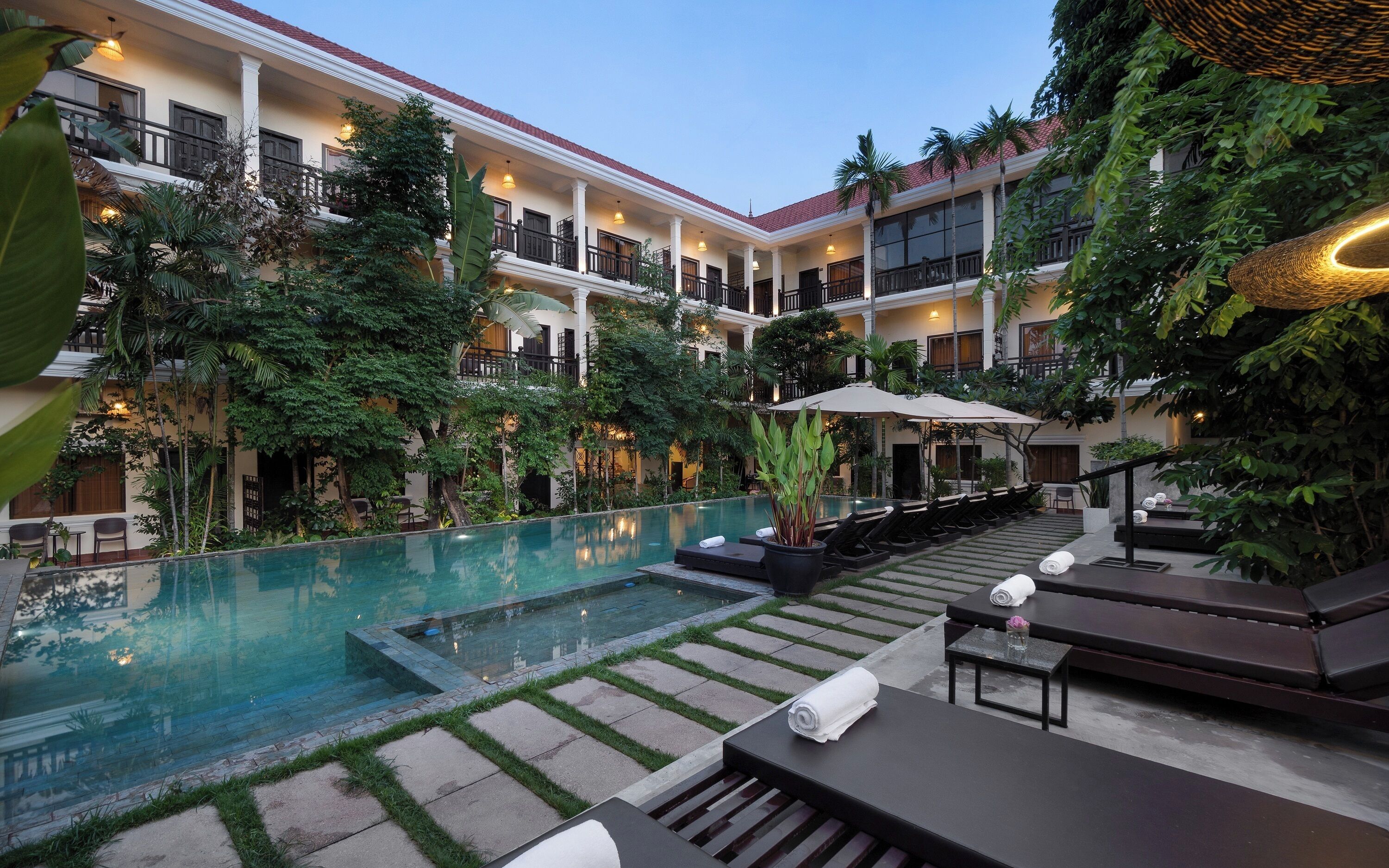 Outdoor pool, open 9:00 AM to 9:00 PM, sun loungers