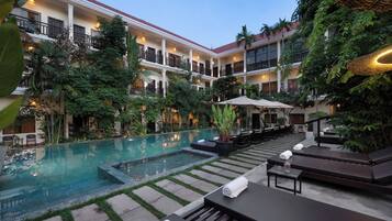 Outdoor pool, open 9:00 AM to 9:00 PM, sun loungers