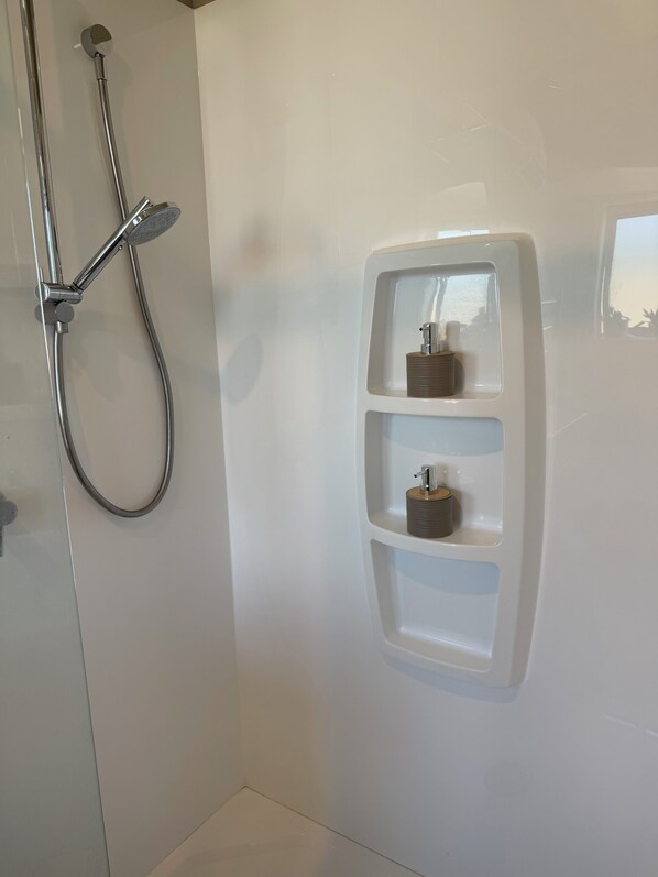Hair dryer, towels, soap, toilet paper