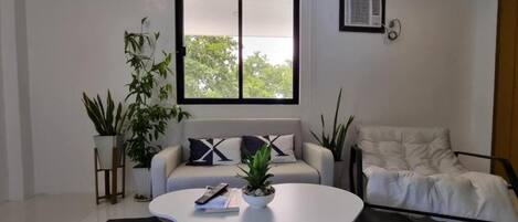 Camera Deluxe, balcone, vista mare | Area soggiorno