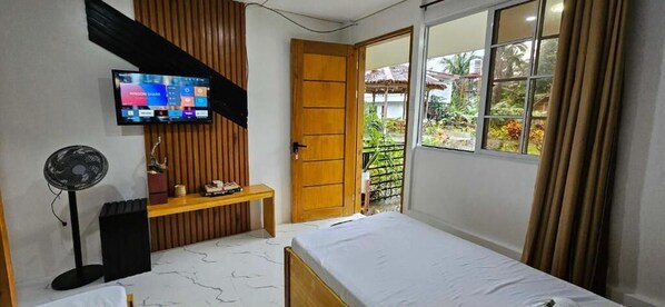 Habitación clásica con 2 camas individuales, balcón, vista al jardín