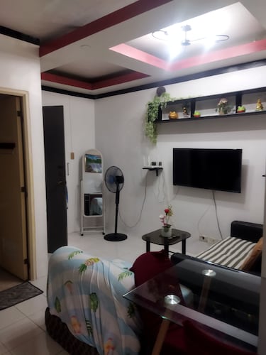 1_Las Asturias Charming Condo Just Steps from Enchanted Kingdom