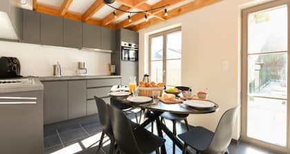 Two holiday homes located next to each other.