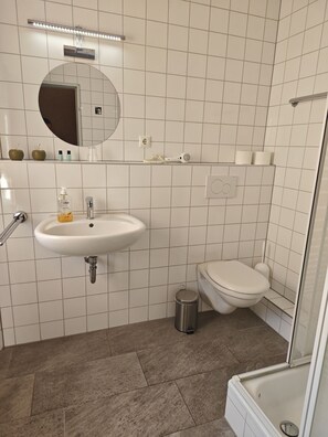 Classic Twin Room, Private Bathroom | Bathroom | Hair dryer, towels, soap, shampoo