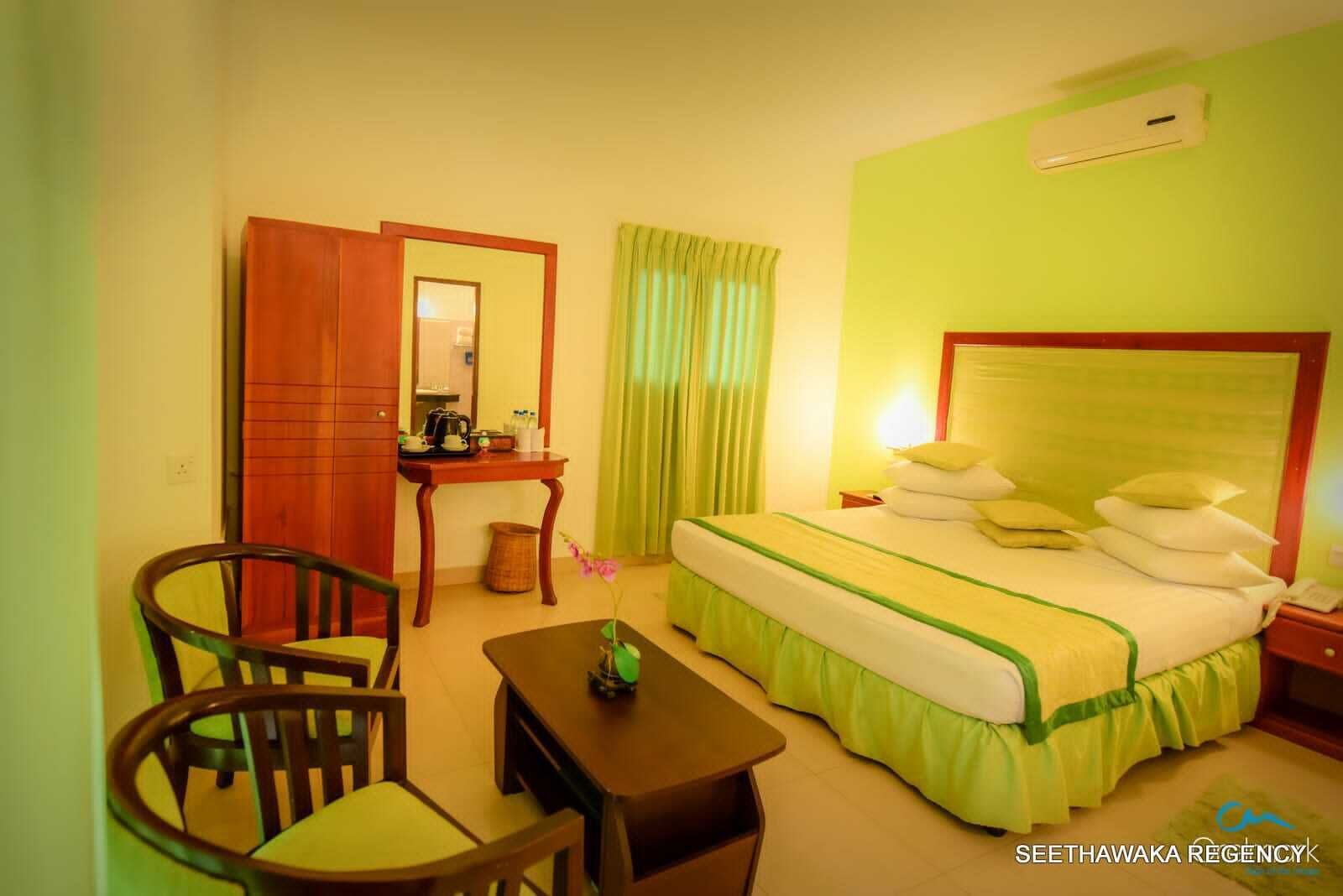 Quarto casal luxo, vista para o jardim