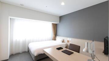 Desk, laptop workspace, blackout drapes, iron/ironing board