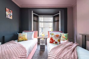 4 bedrooms, iron/ironing board, WiFi (free), bed sheets