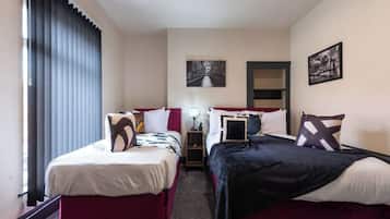 4 slaapkamers, een strijkplank/strijkijzer, gratis wifi, beddengoed