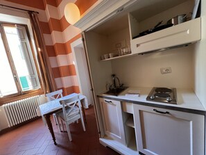 Estudio Confort, vistas a la ciudad | Cocina privada