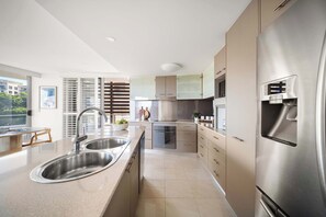 Fridge, microwave, oven, stovetop - Salt & Sky - Stylish Apartment with Pool & Spa (Caloundra Region)