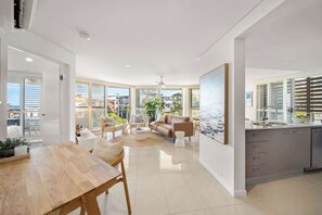 TV, offices - Salt & Sky - Stylish Apartment with Pool & Spa (Caloundra Region)