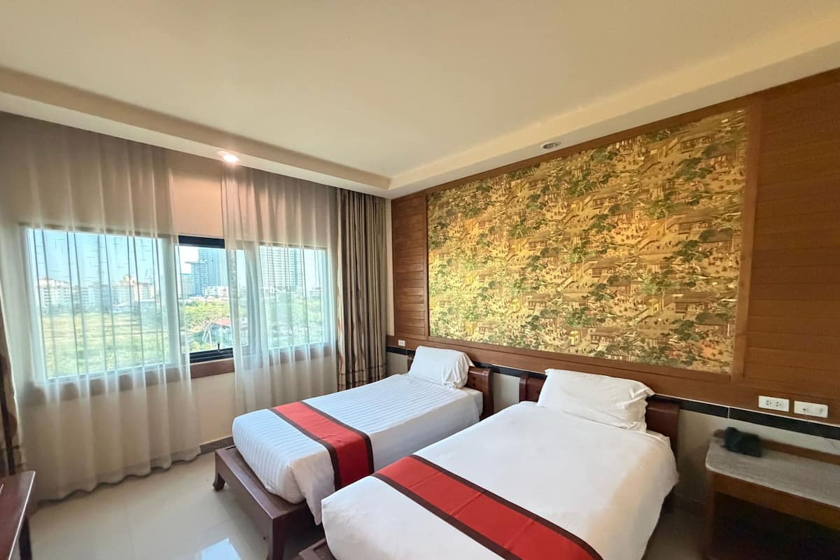 Kamar Twin Standar | Meja kerja, Wi-Fi gratis, dan seprai linen