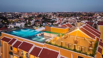 Outdoor pool, open 6:00 AM to 10:00 PM, pool umbrellas, pool loungers