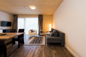 Comfort Apartment, 1 Bedroom, Kitchen | Living area | 35-inch flat-screen TV with satellite channels