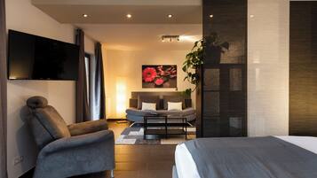 Superior Apartment, 2 Bedrooms, Kitchen | Living area | 35-inch flat-screen TV with satellite channels