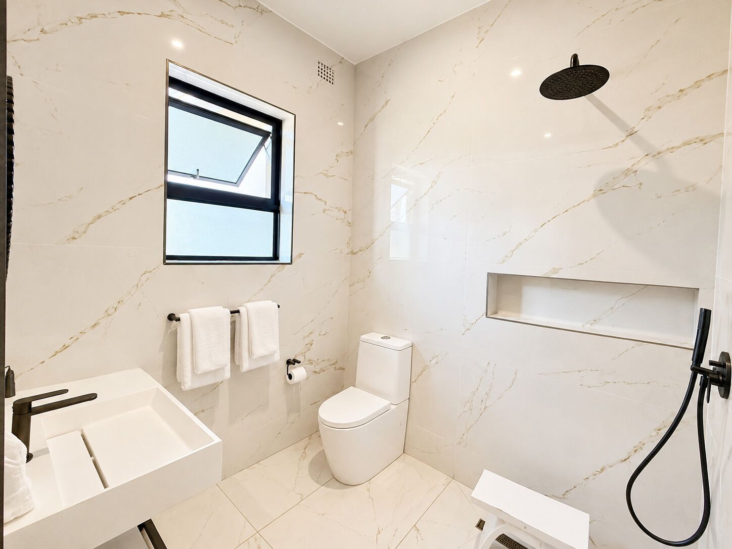 Shower, rainfall showerhead, free toiletries, hair dryer