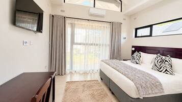 Deluxe Double Room, Garden View | In-room safe, desk, blackout curtains, soundproofing