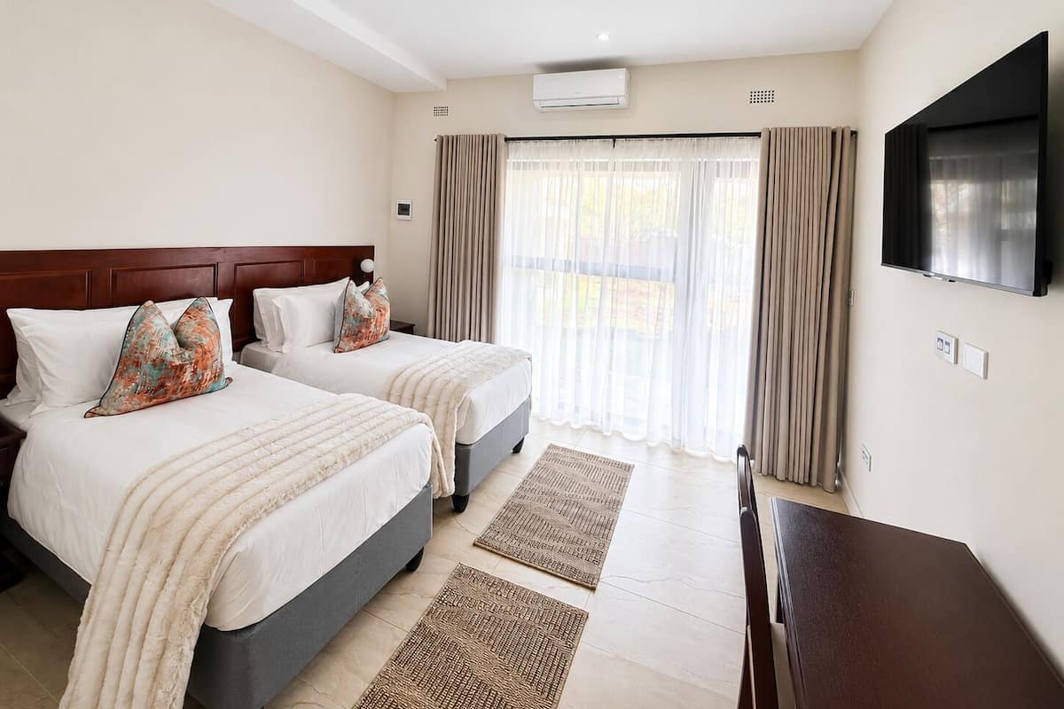 In-room safe, desk, blackout curtains, soundproofing
