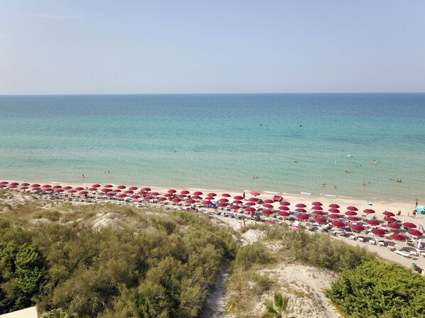 Private beach, sun loungers, beach umbrellas, beach bar