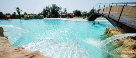 Outdoor pool, open 9:00 AM to 7:00 PM, pool loungers