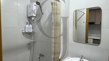 Shower, bidet, towels, soap