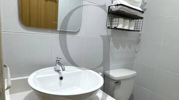 Shower, bidet, towels, soap